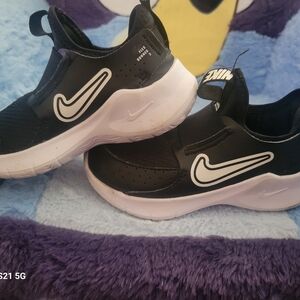 Nike Kids' Black and White Slip-On Athletic Shoes